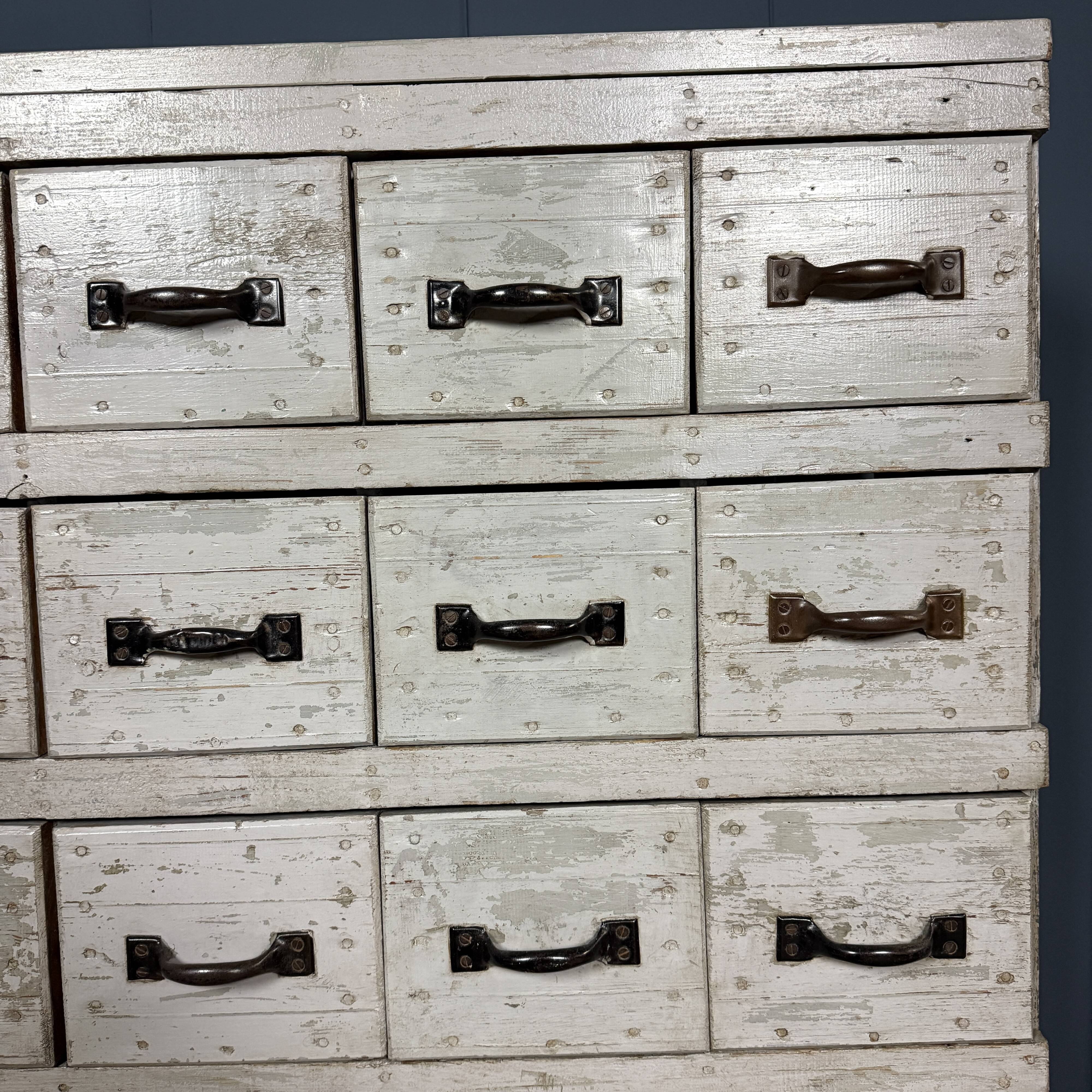 Old light grey workshop drawer cabinet with 25 drawers