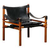 Fauteuil lounge Sirocco Safari d'Arne Norell en palissandre et cuir noir, Suède