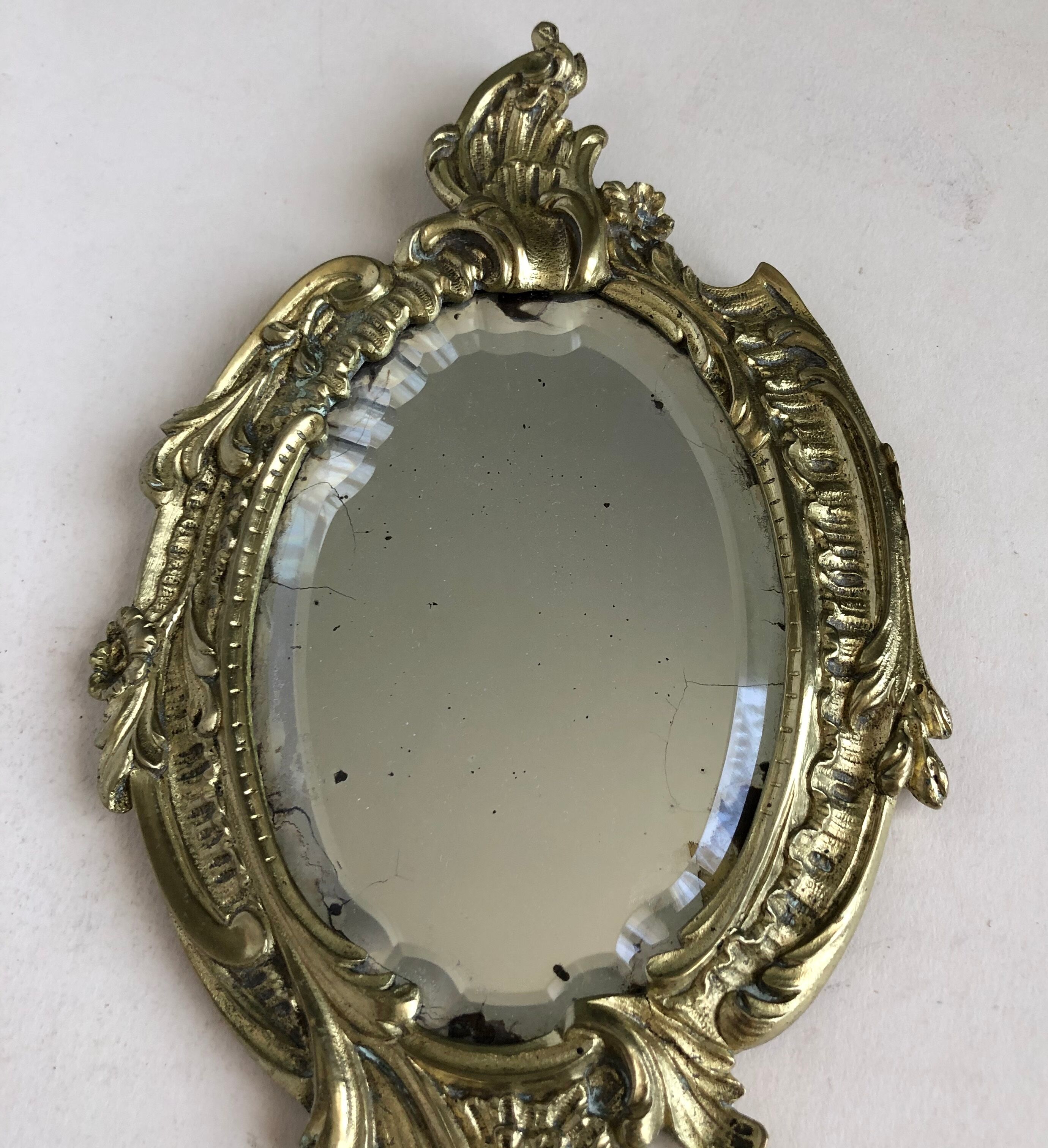 Hand-faced mirror