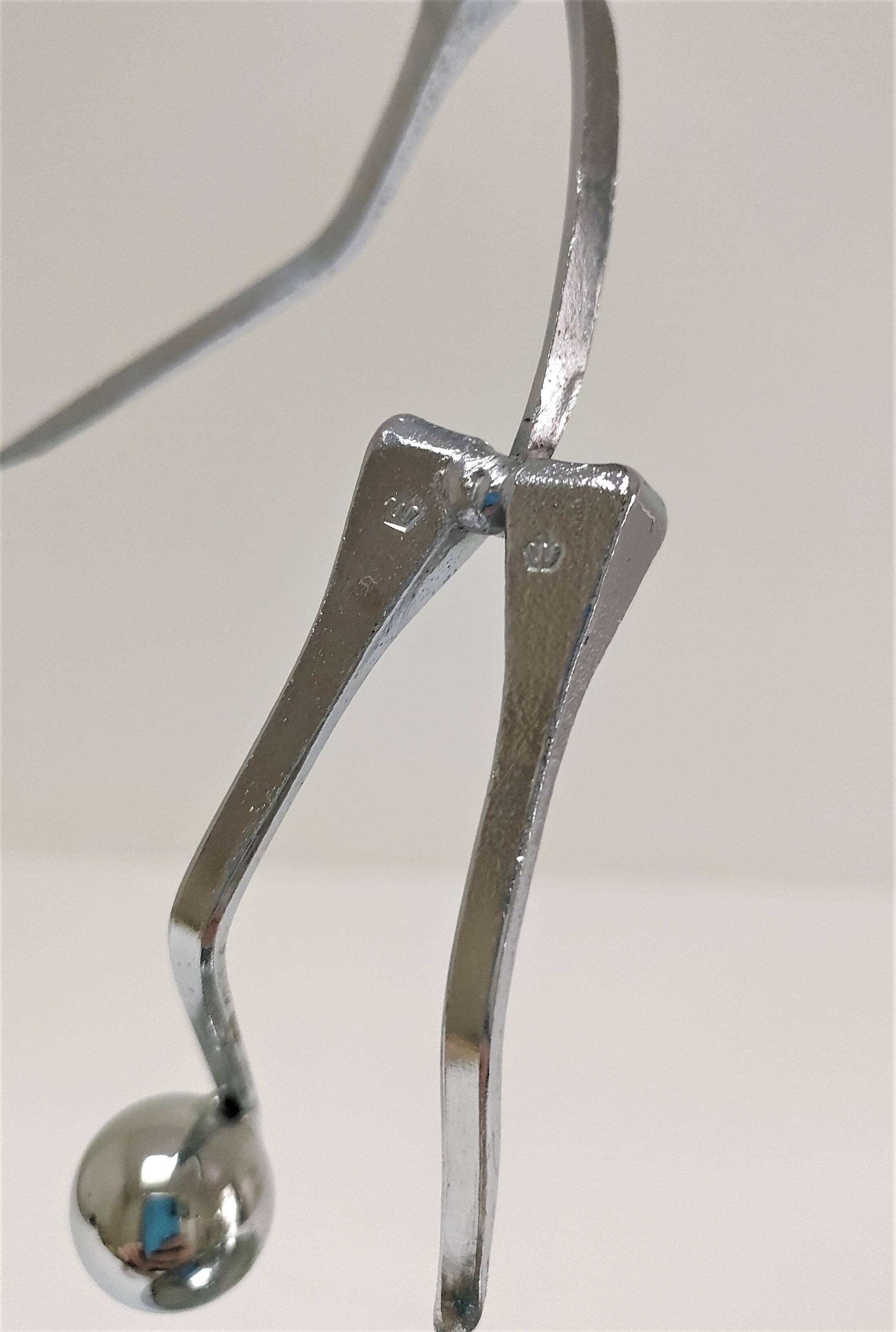 steel sculpture, sportsman's hallmark, goldsmith's crown