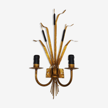 Golden metal reed sconce