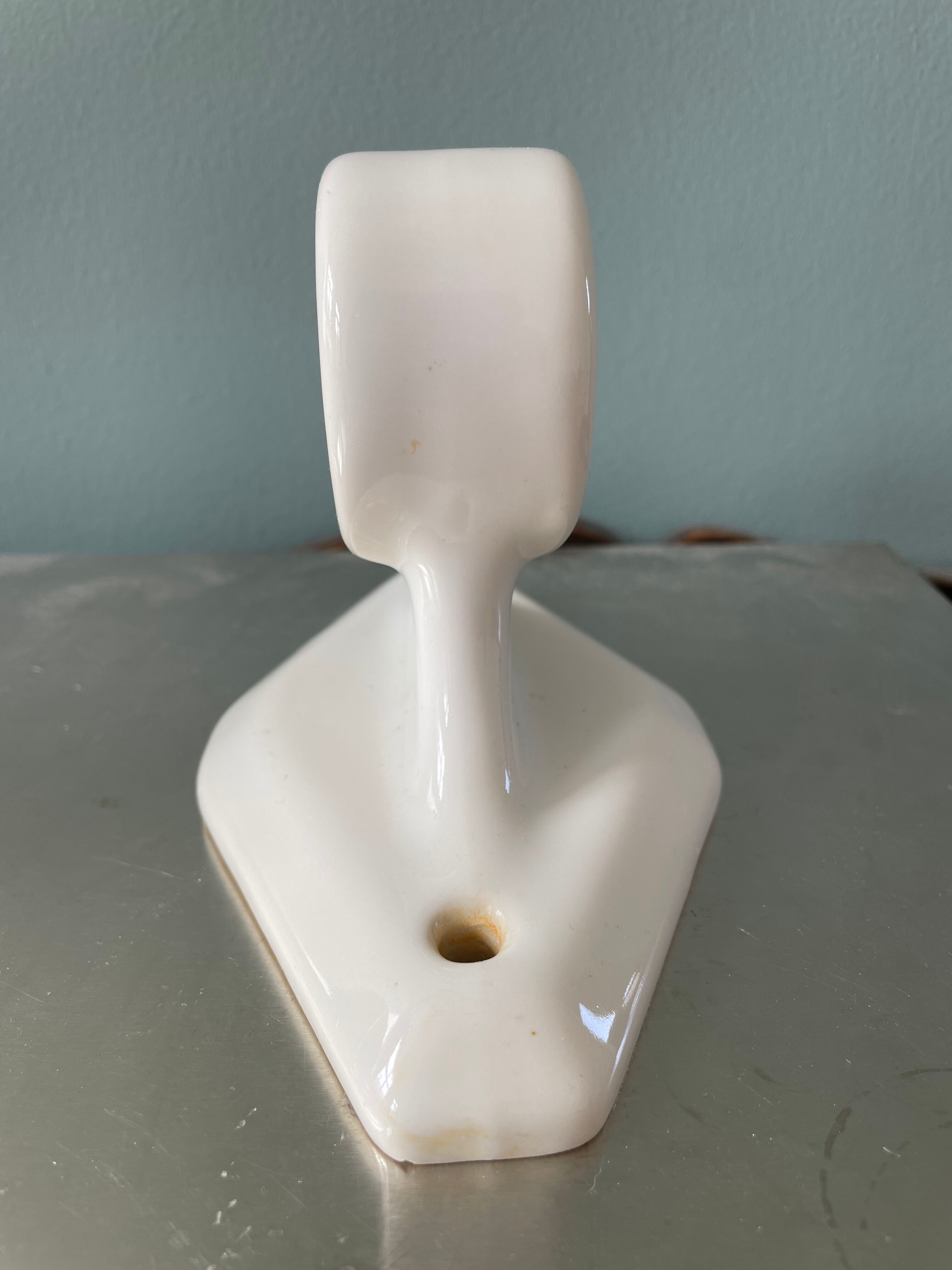 White porcelain towel rack, early twentieth century