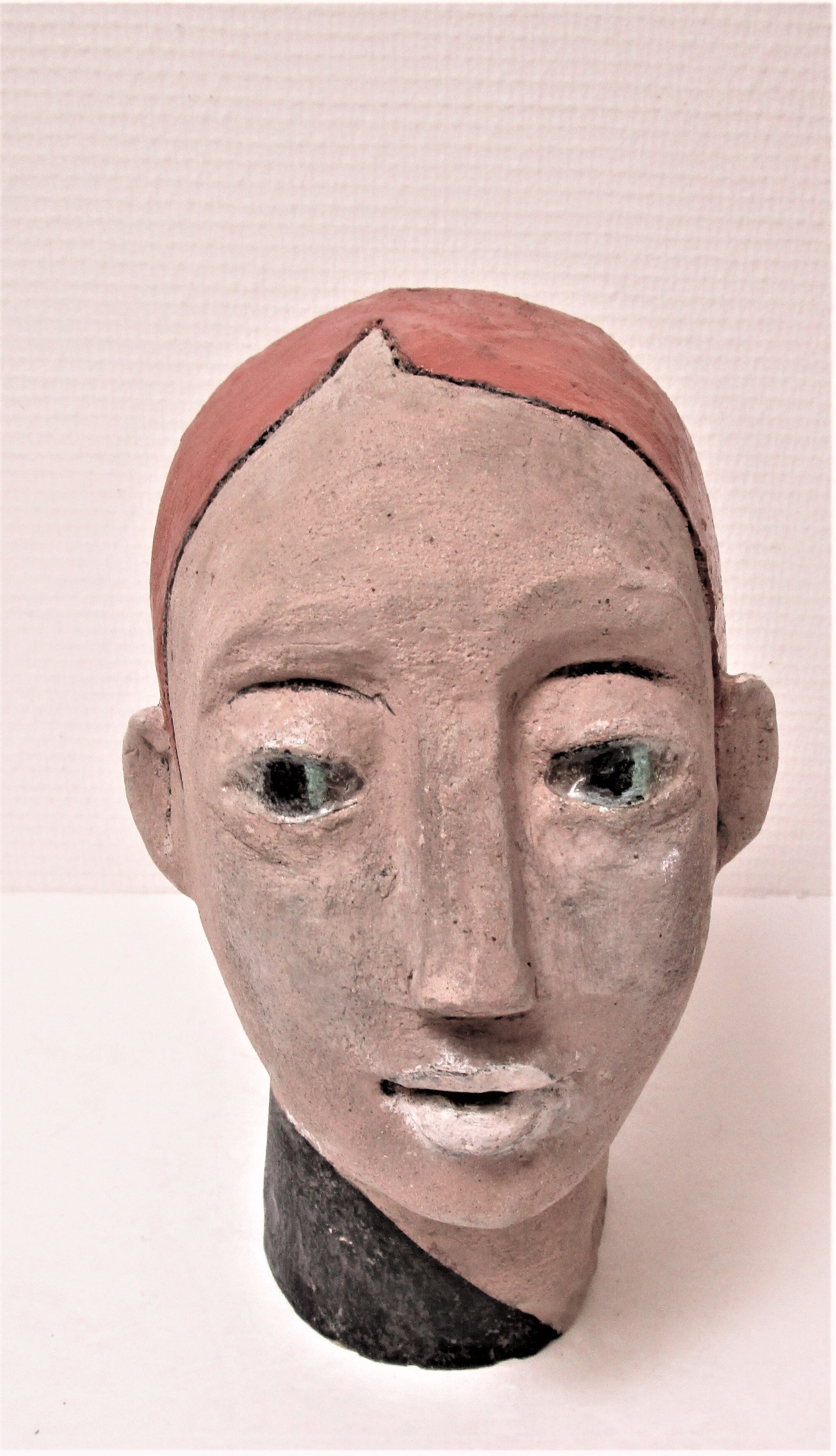 Redheaded boyish woman modeled in earth signed 60/70 years