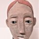 Redheaded boyish woman modeled in earth signed 60/70 years