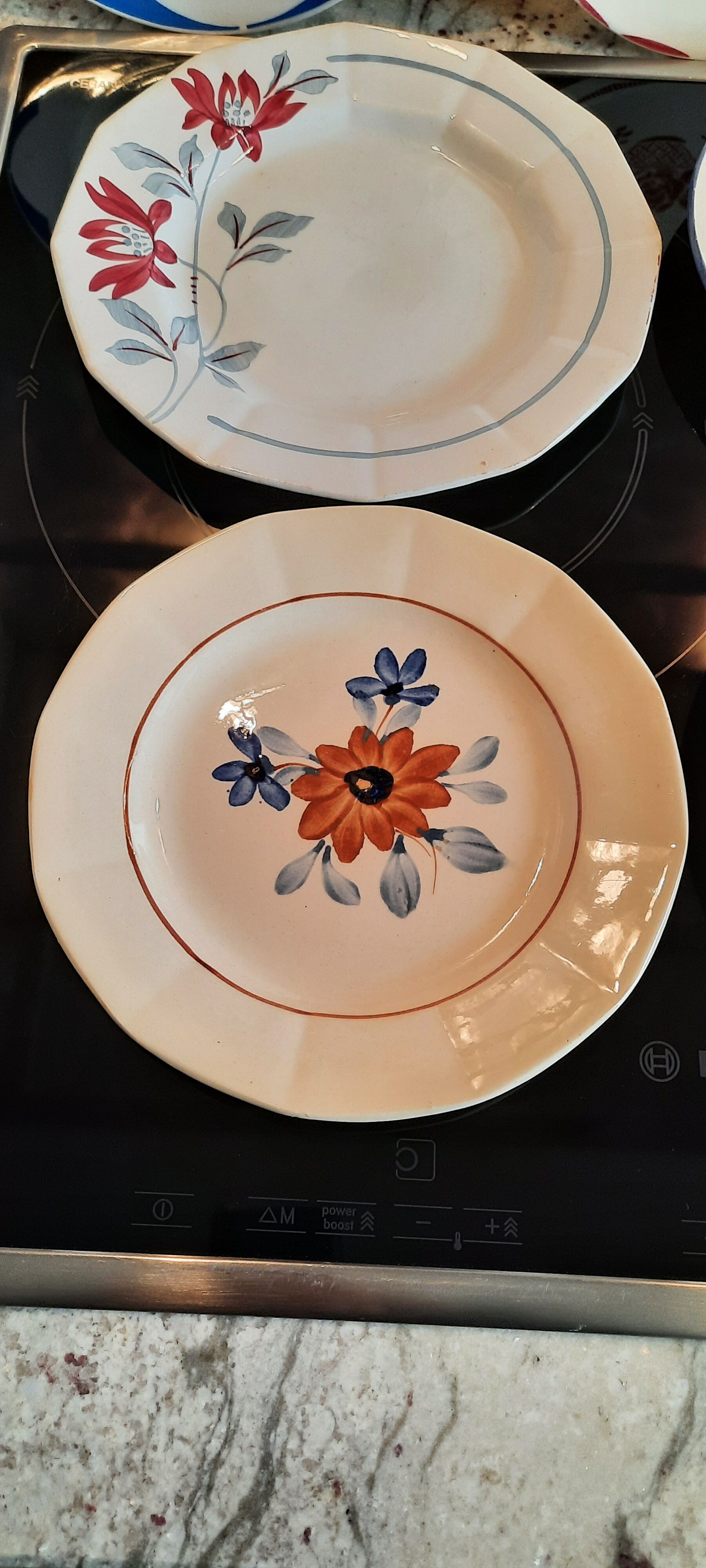 Old flat faience plates