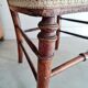 Antique chair turned wood sitting velvet flowers