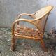 Fauteuil bas en rotin et bambou dossier canné vintage