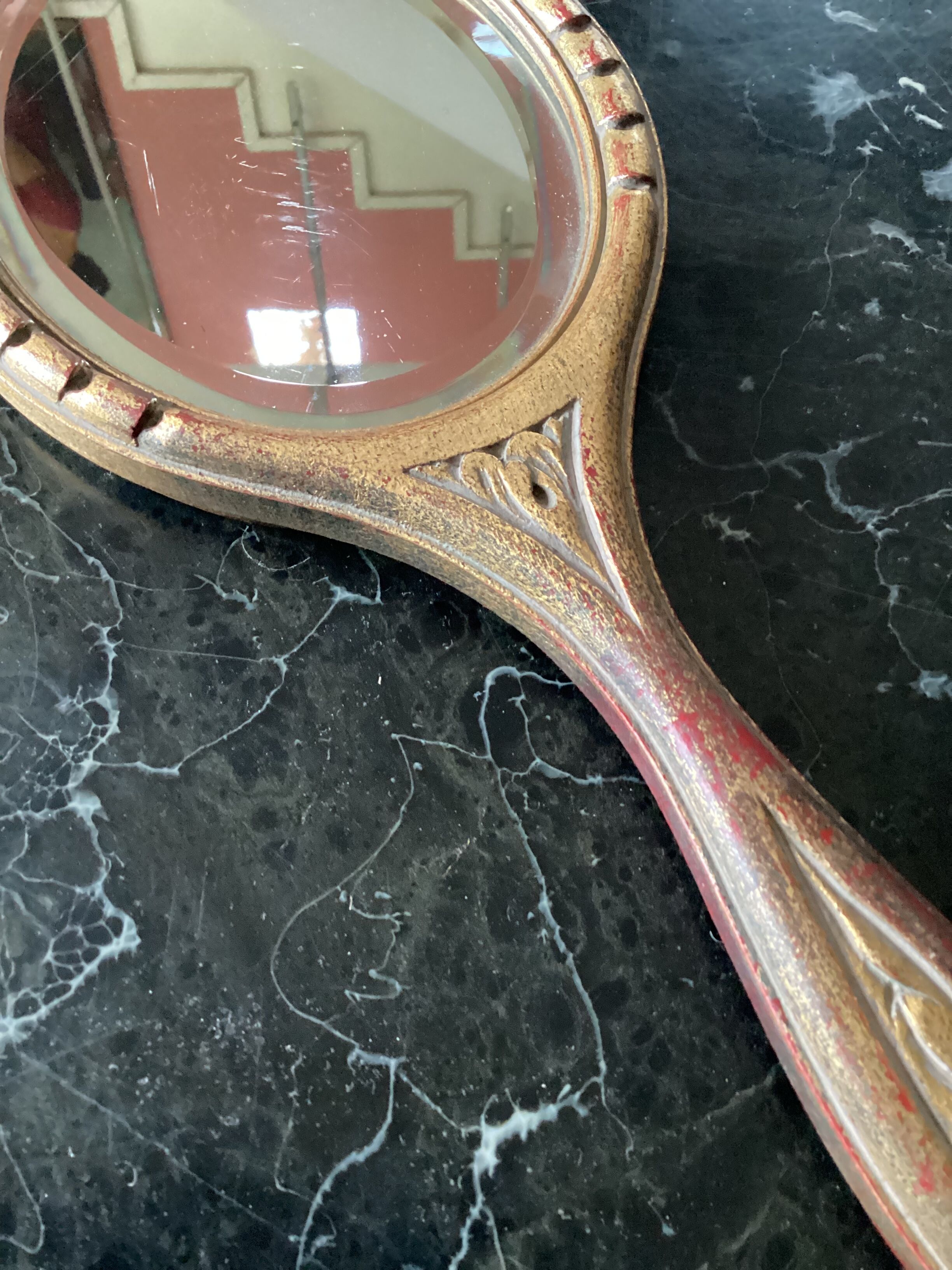 Hand-facing beveled mirror surrounded by wood dimension: height -38cm- width -15.5cm-