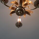 Vintage chandelier in golden metal
