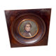 Miniature portrait of a man in a wooden frame