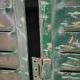 Lot of old green shutters in 4-part iron screen headboard