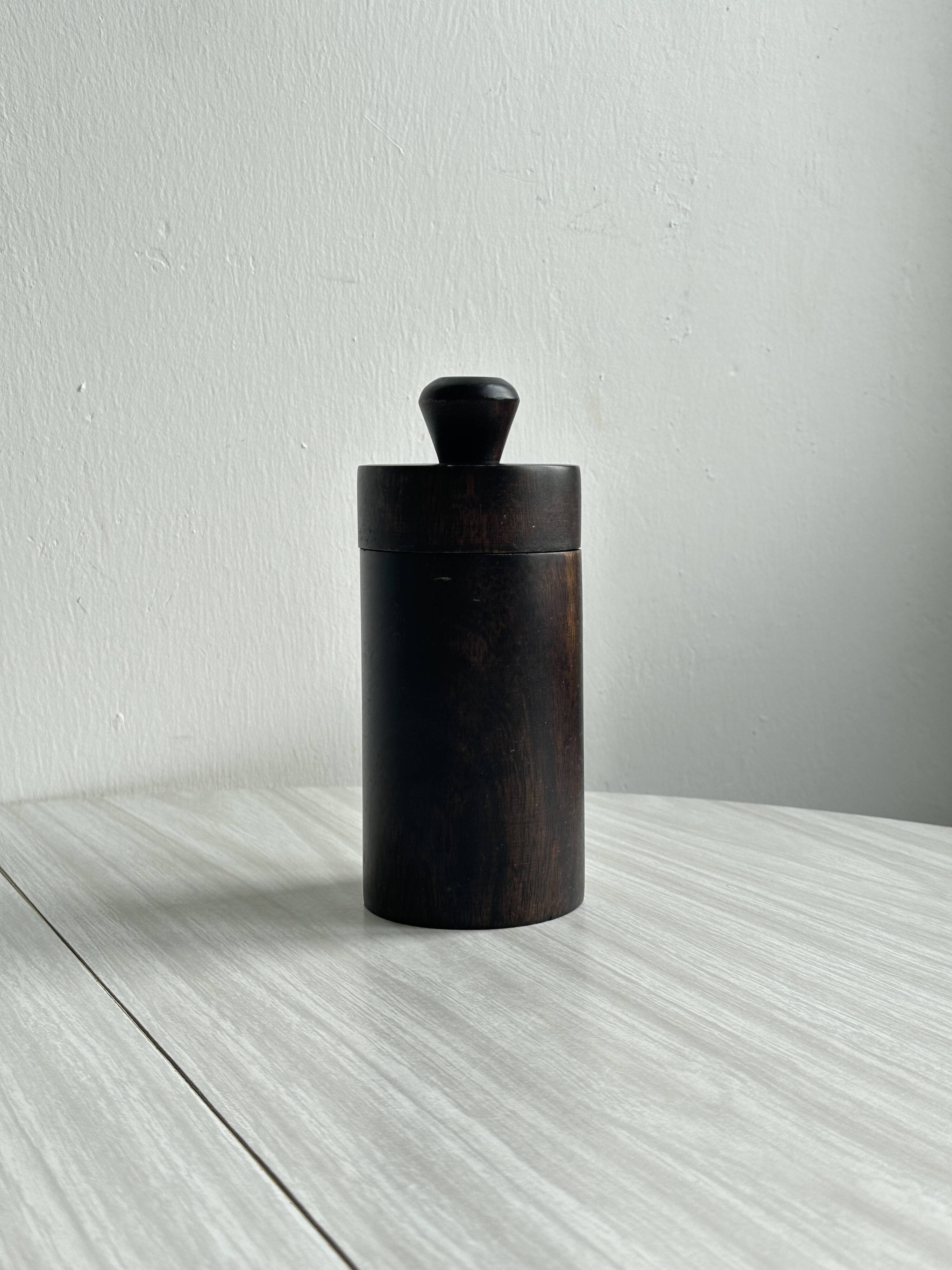 Old brutalist style wooden pot.