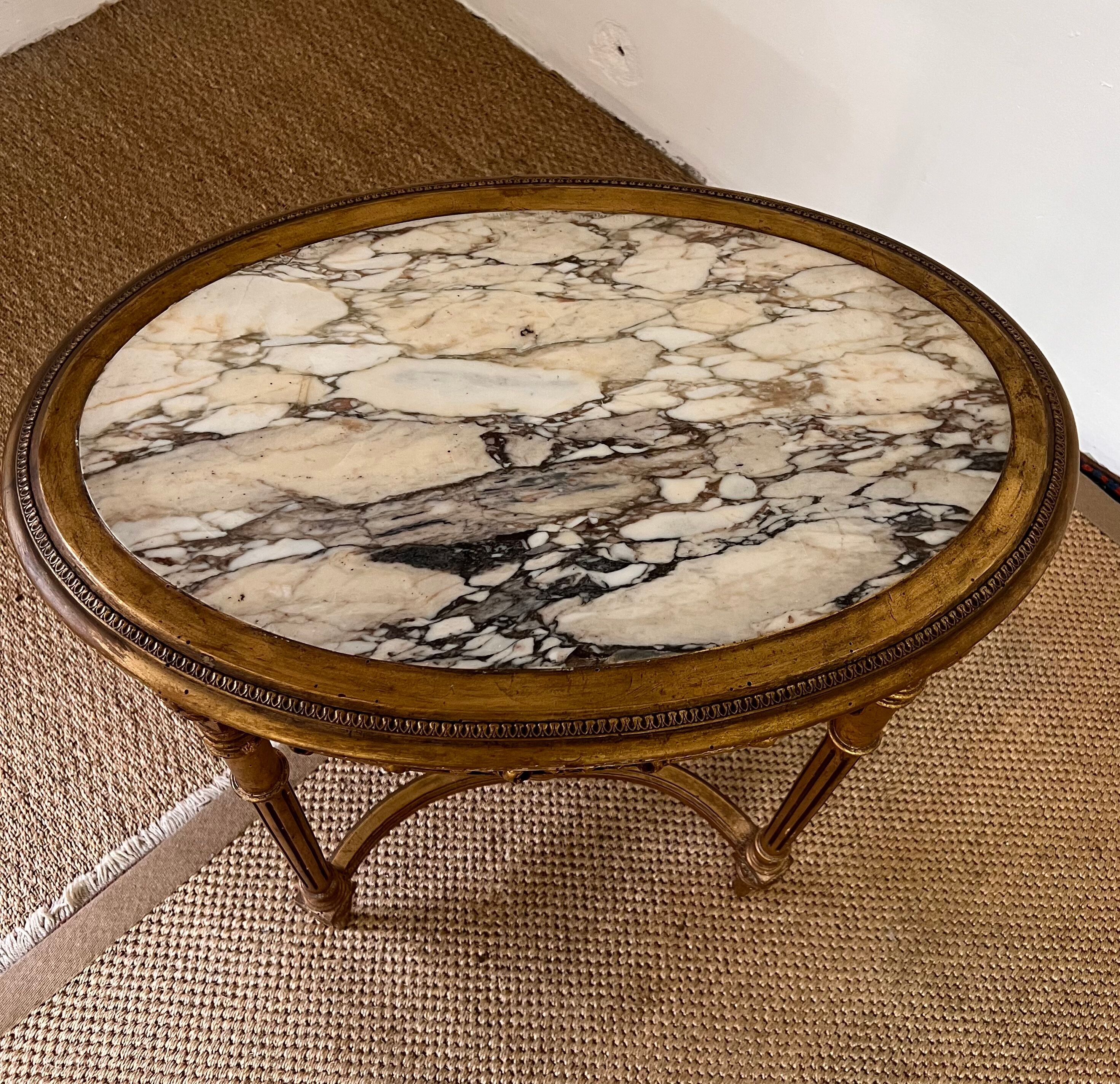 Wooden and marble pedestal table