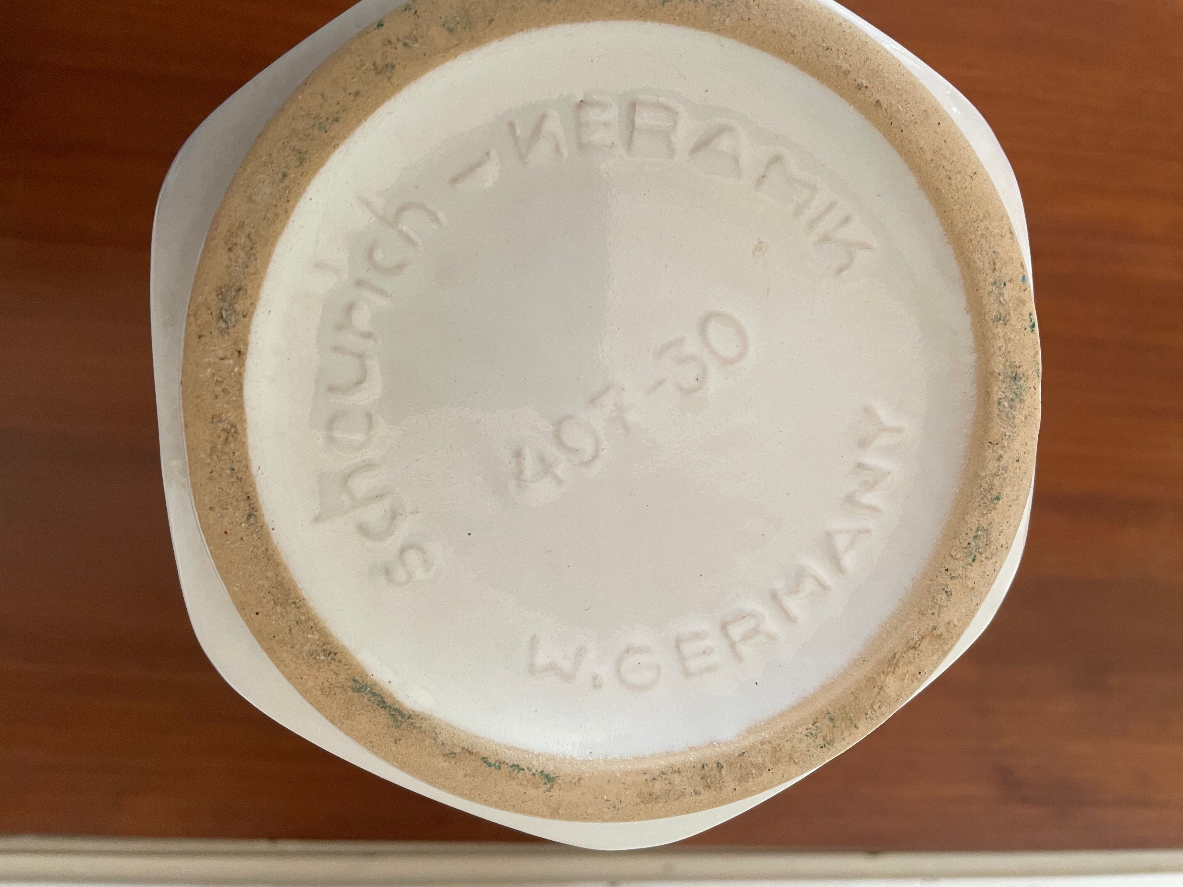 White ceramic ansé vase