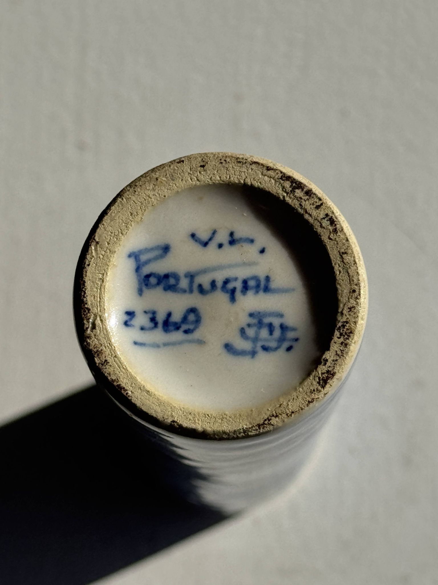 Vintage blue and white earthenware soliflore vase from Portugal.