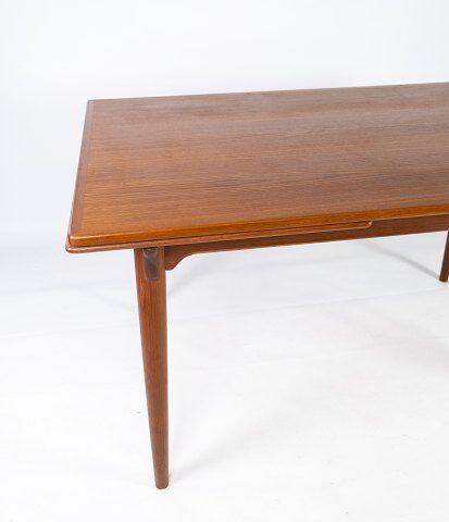 Dining table in teak with extentions of danish design from the 1960s.