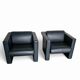Pair / Trix and Robert Haussmann / Dark grey leather chairs by Knoll