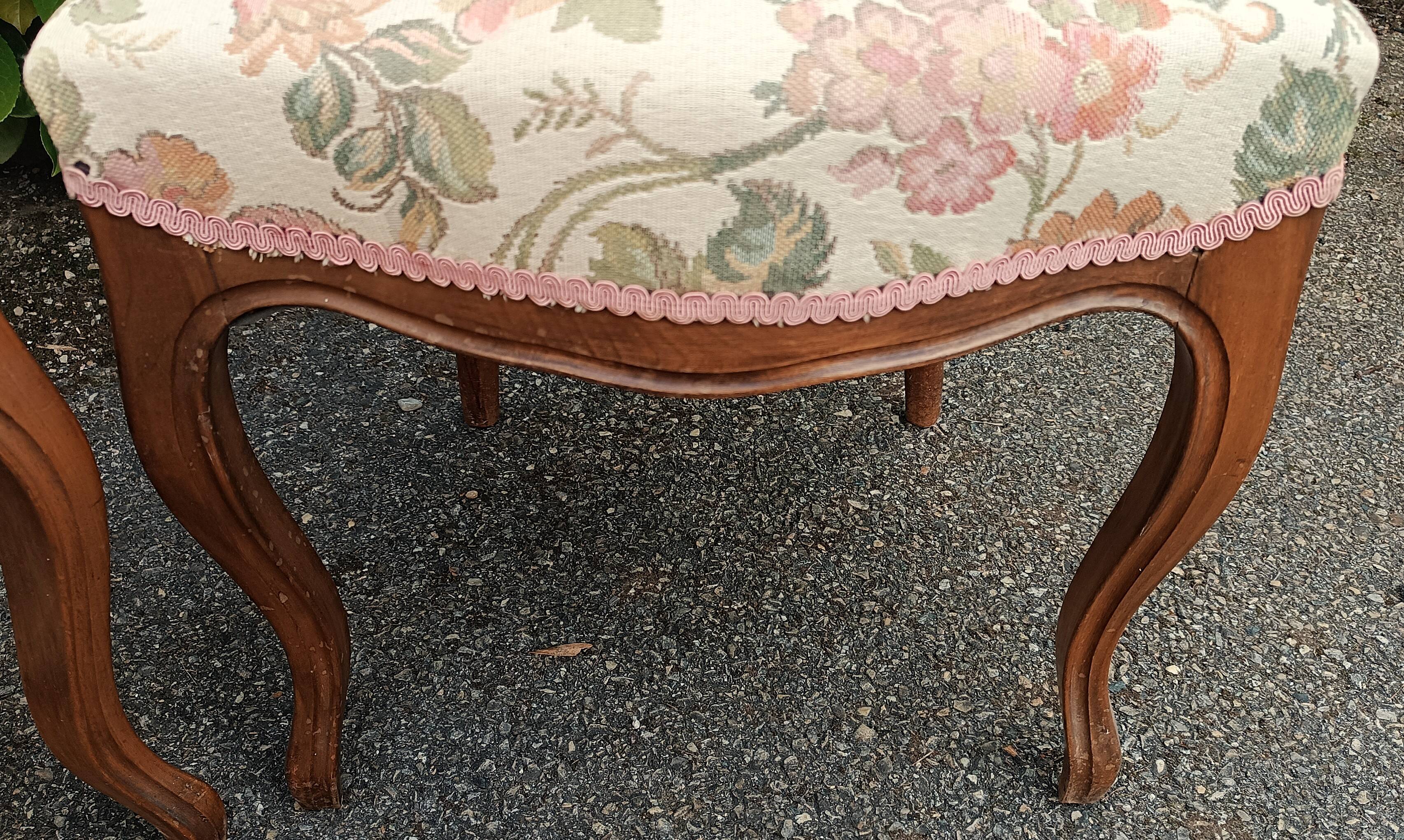 Pair of Louis XV chairs in carved walnut.