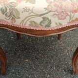 Pair of Louis XV chairs in carved walnut.