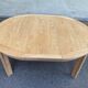 Table à manger scandinave ronde extensible décapée en chêne brut 1970