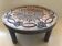 Round ceramic coffee table