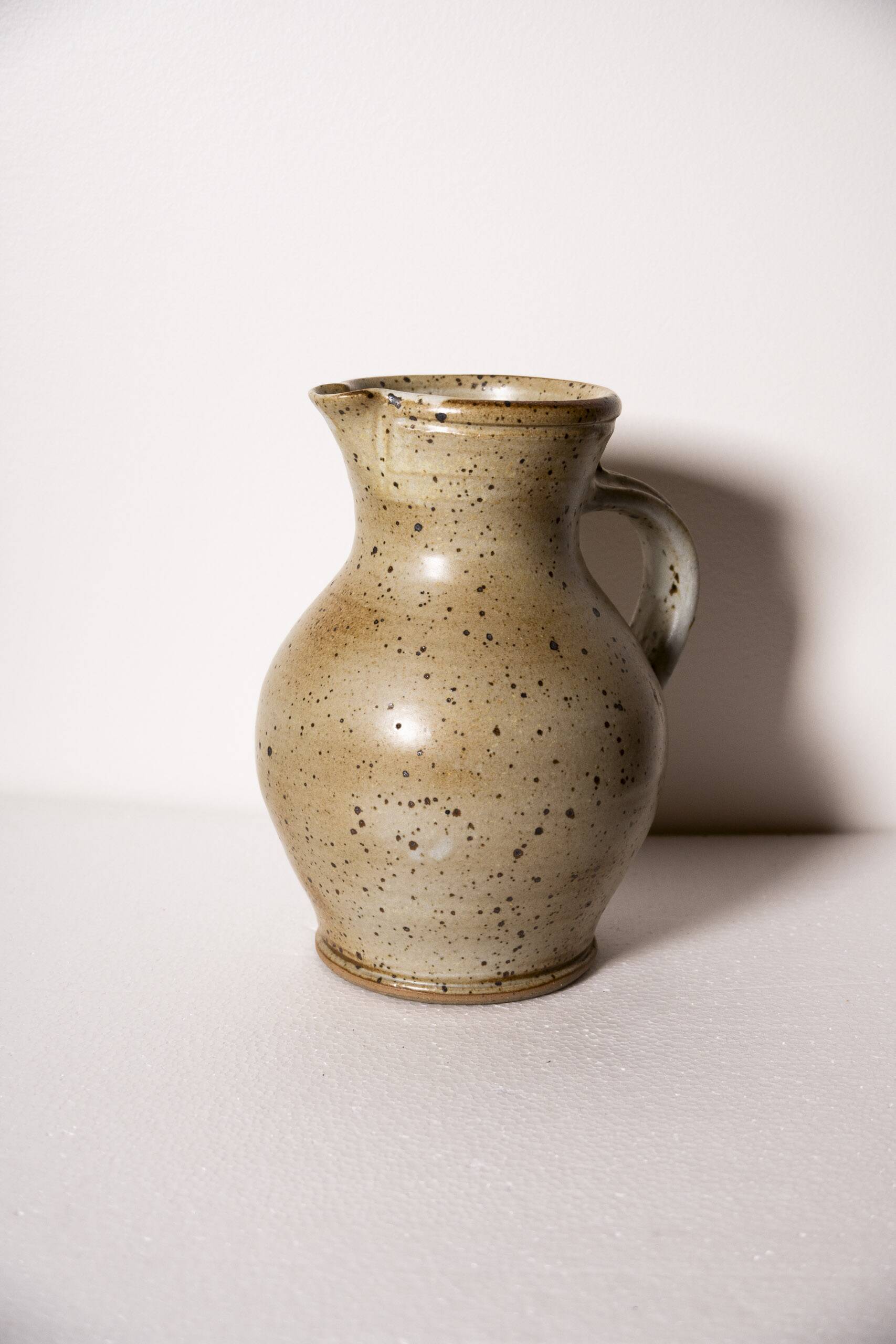 Large stoneware pitcher, signed Gustave Tiffoche, 20th century