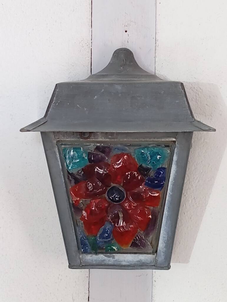 Zinc and colored glass wall light