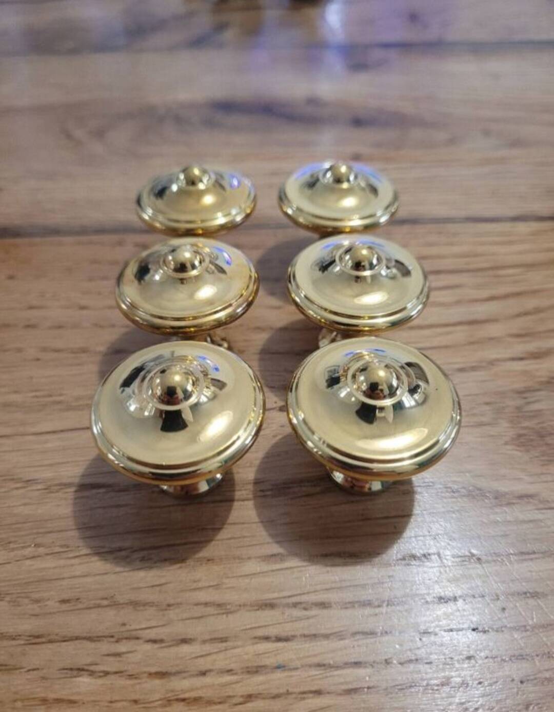 6 polished brass furniture knobs