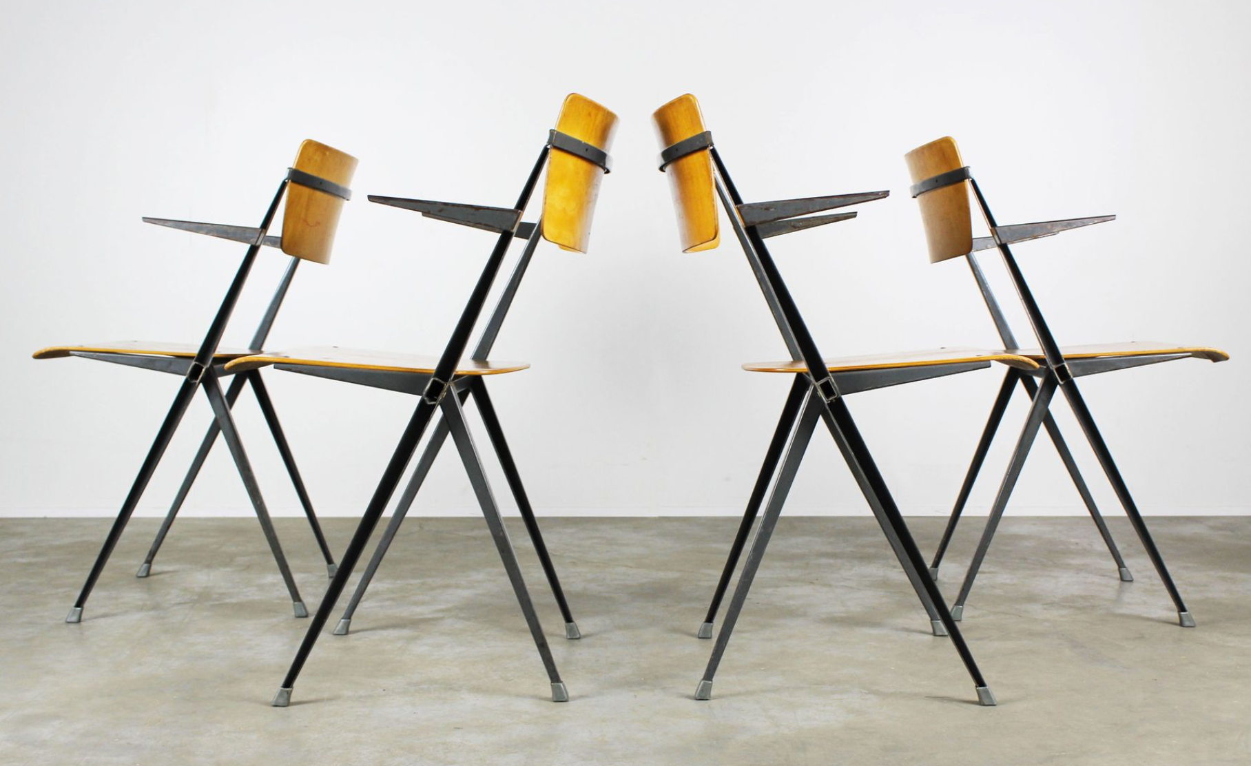 Vintage Pyramid chairs with armrests by Wim Rietveld