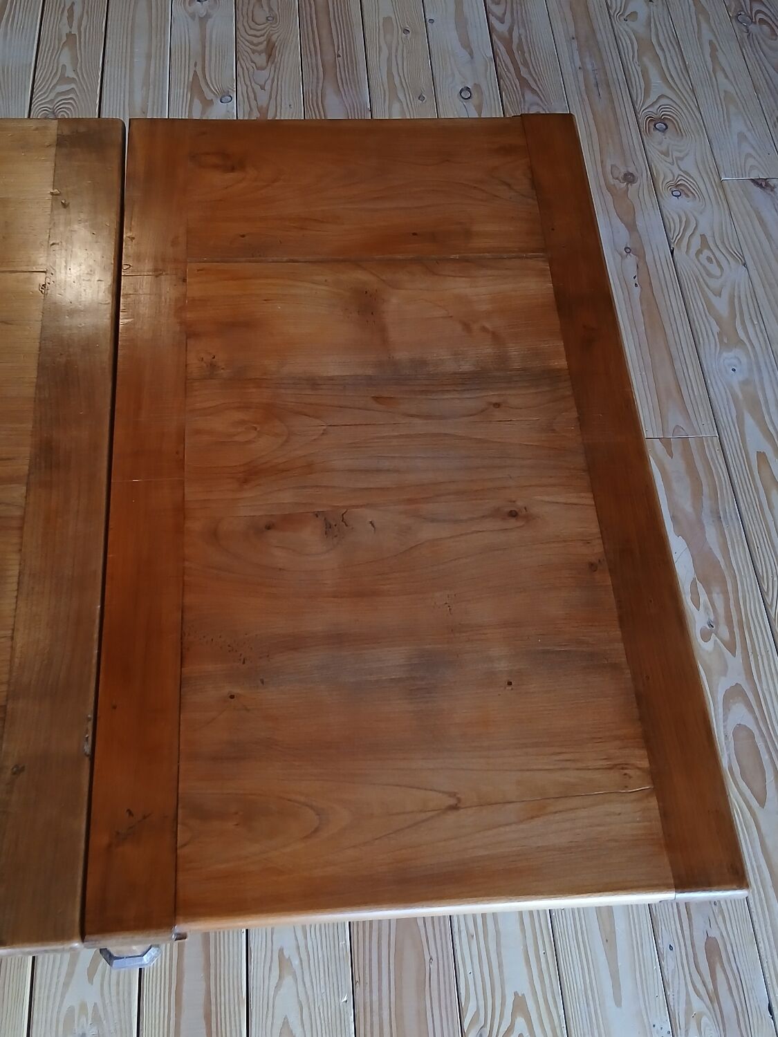 Elm farmhouse table with extensions for 6 to 10 people.