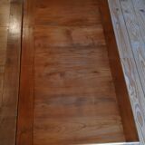 Elm farmhouse table with extensions for 6 to 10 people.