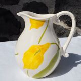 Pitcher with yellow flowers