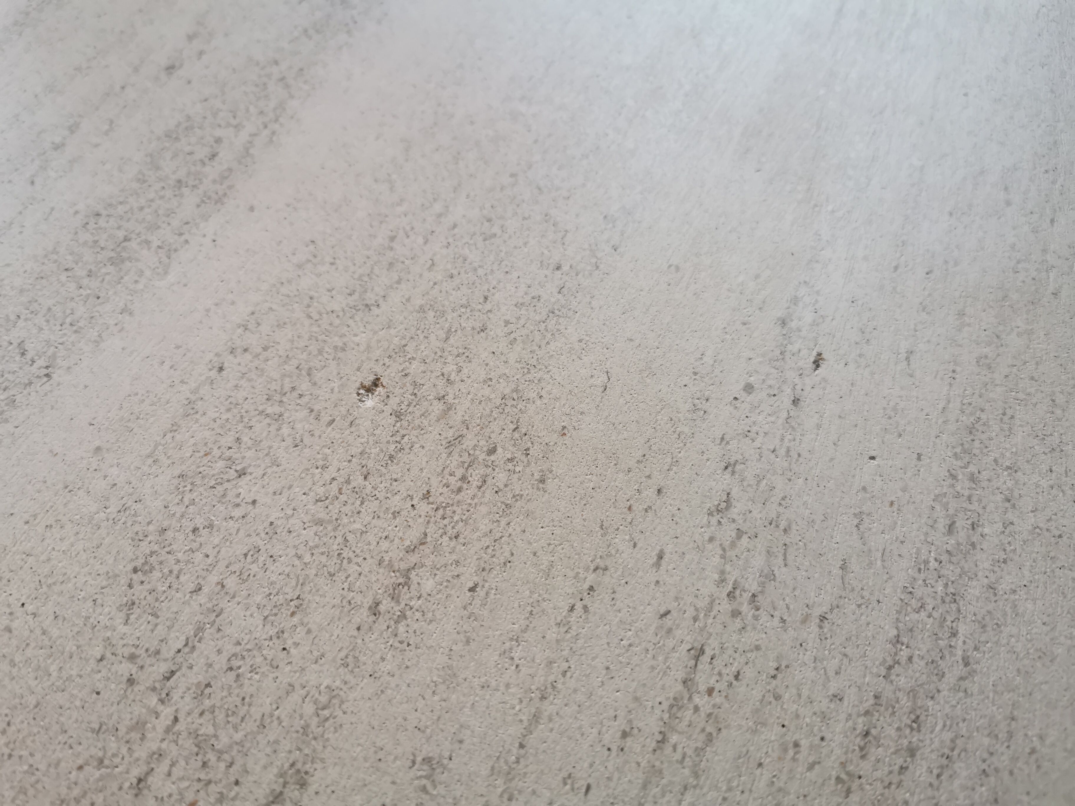 Large oval coffee table in travertine and metal