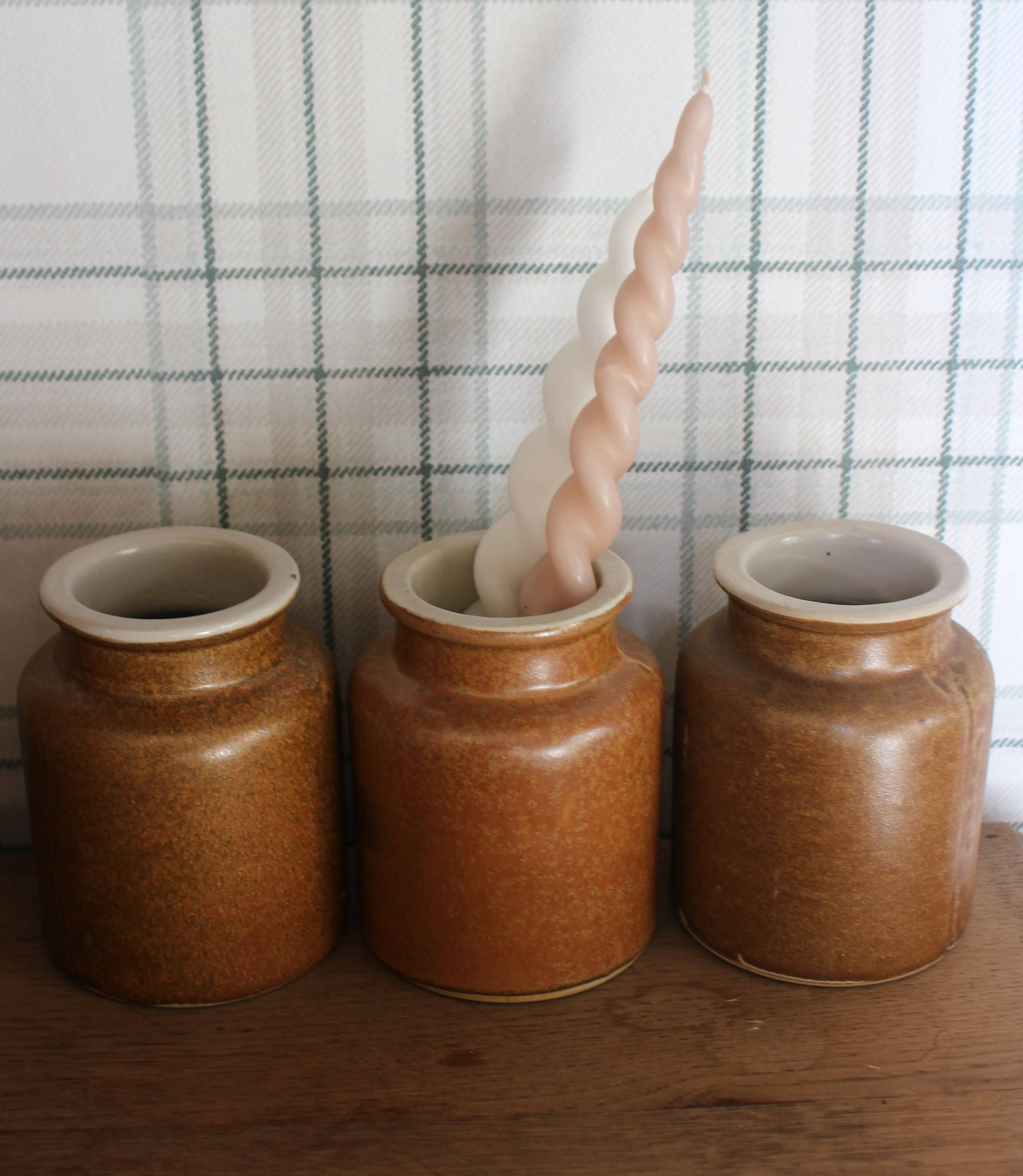 A set of 3 vintage glazed stoneware vases for indoor use.