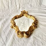 Rococo wall mirror in golden resin