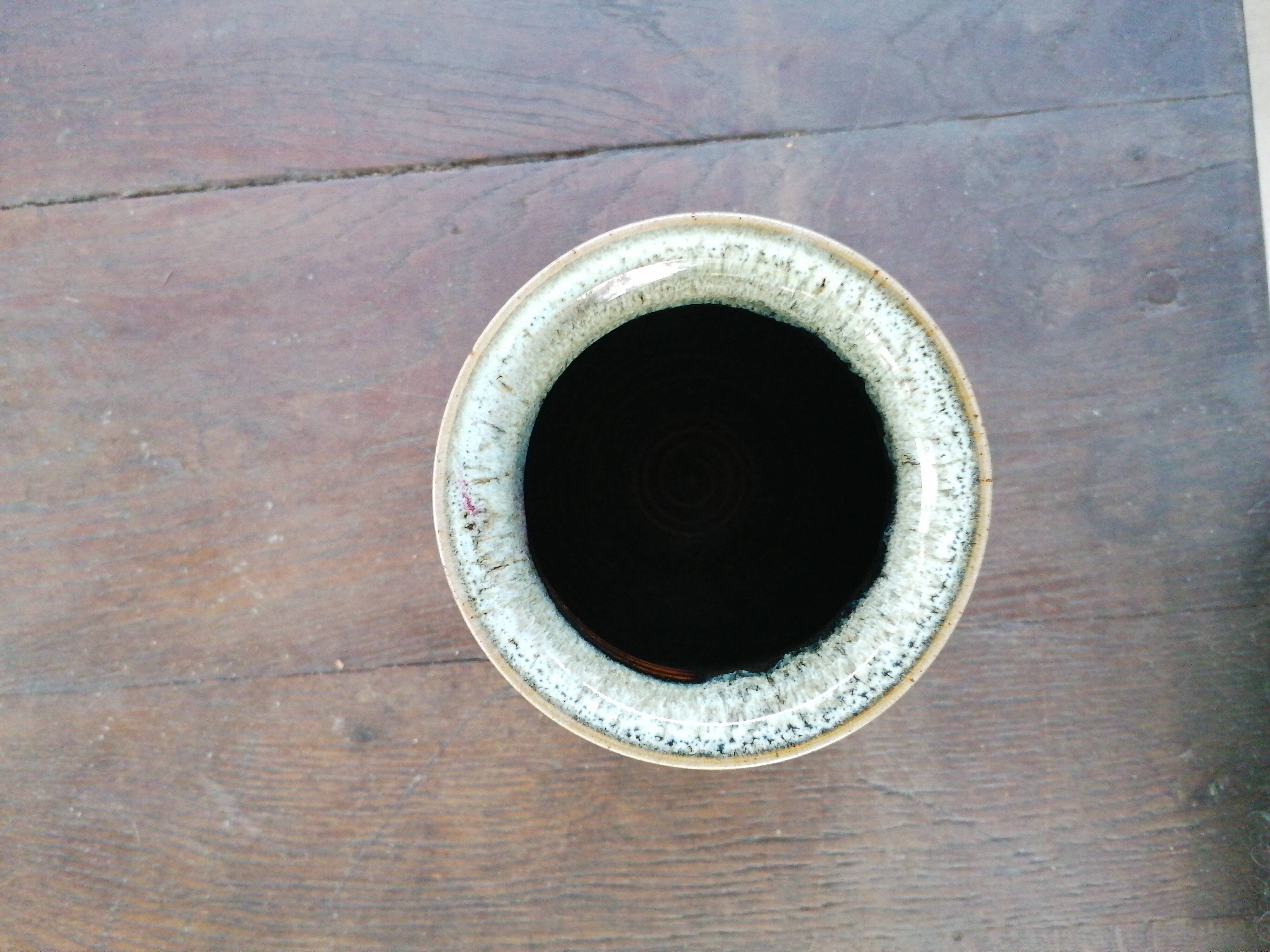 Green/pink speckled ceramic vase