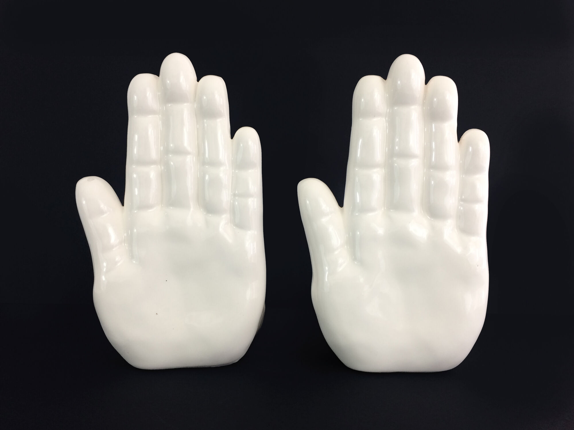 Pair of vintage handends in white ceramic to be used to comfort. Year 80