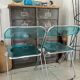 Set of 4 blue Plia folding chairs by Castelli