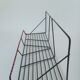 Vintage wall shelf made of metal wire