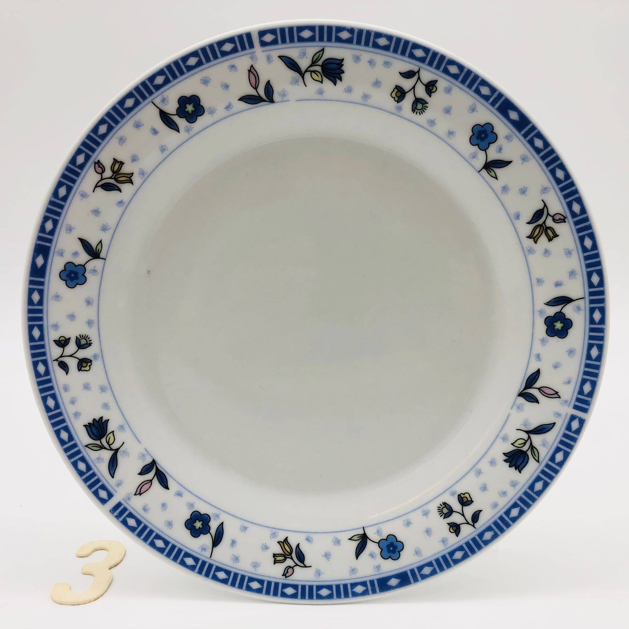 6 “Chriss G. Collection” porcelain dessert plates.