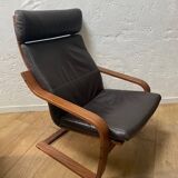 Leather armchair with footrest