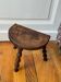 Tripod stool made of turned wood