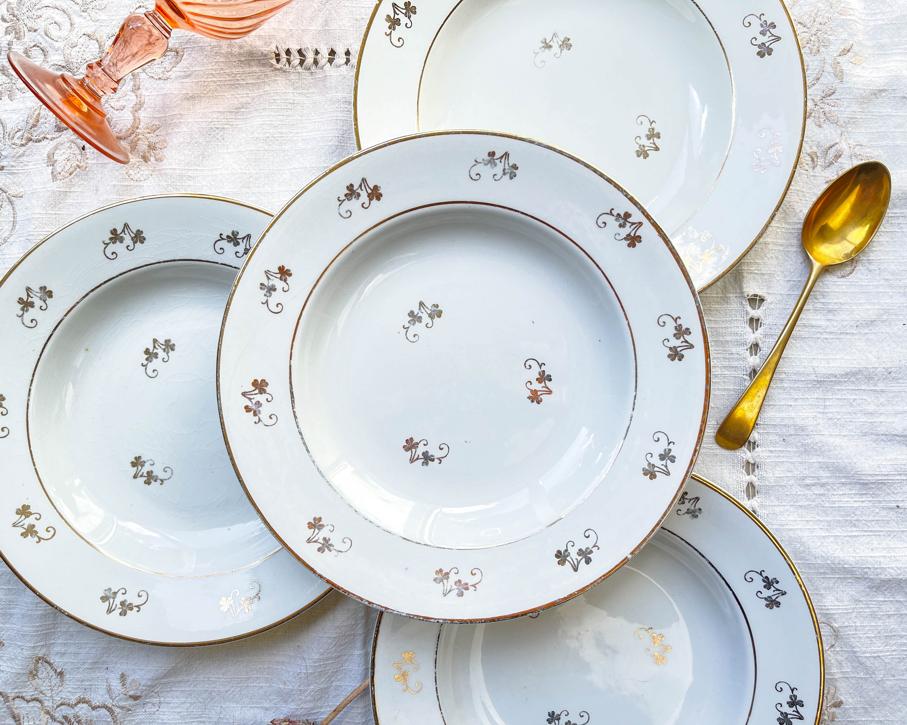 4 white porcelain L'Amandinoise soup plates with gold floral pattern