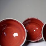 4 Japanese bowls in red glazed mixed stoneware