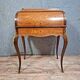 cylinder desk in Louis XV style, elegant and very decorative.