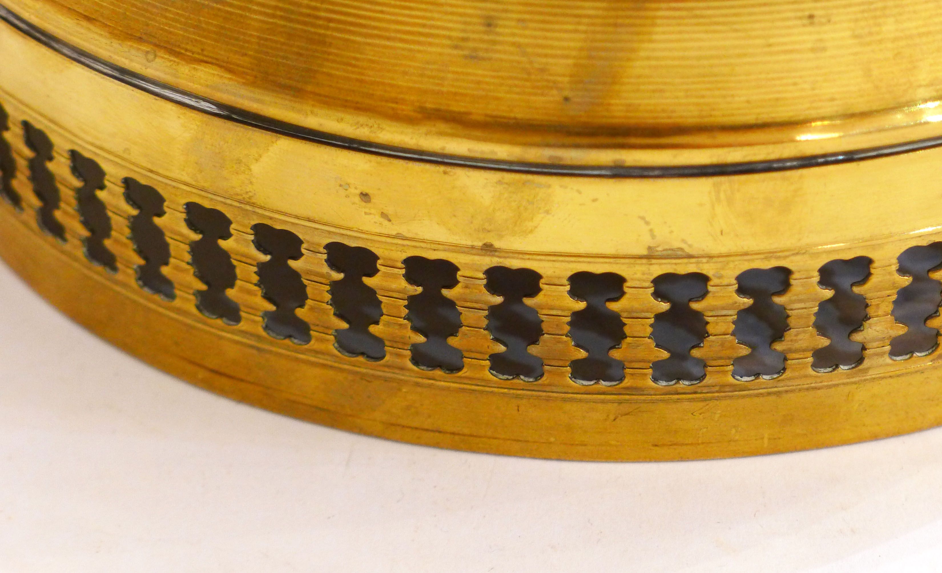 Planter on lion legs, made of golden metal