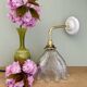 Elbow wall lamp with vintage holophane glass shade