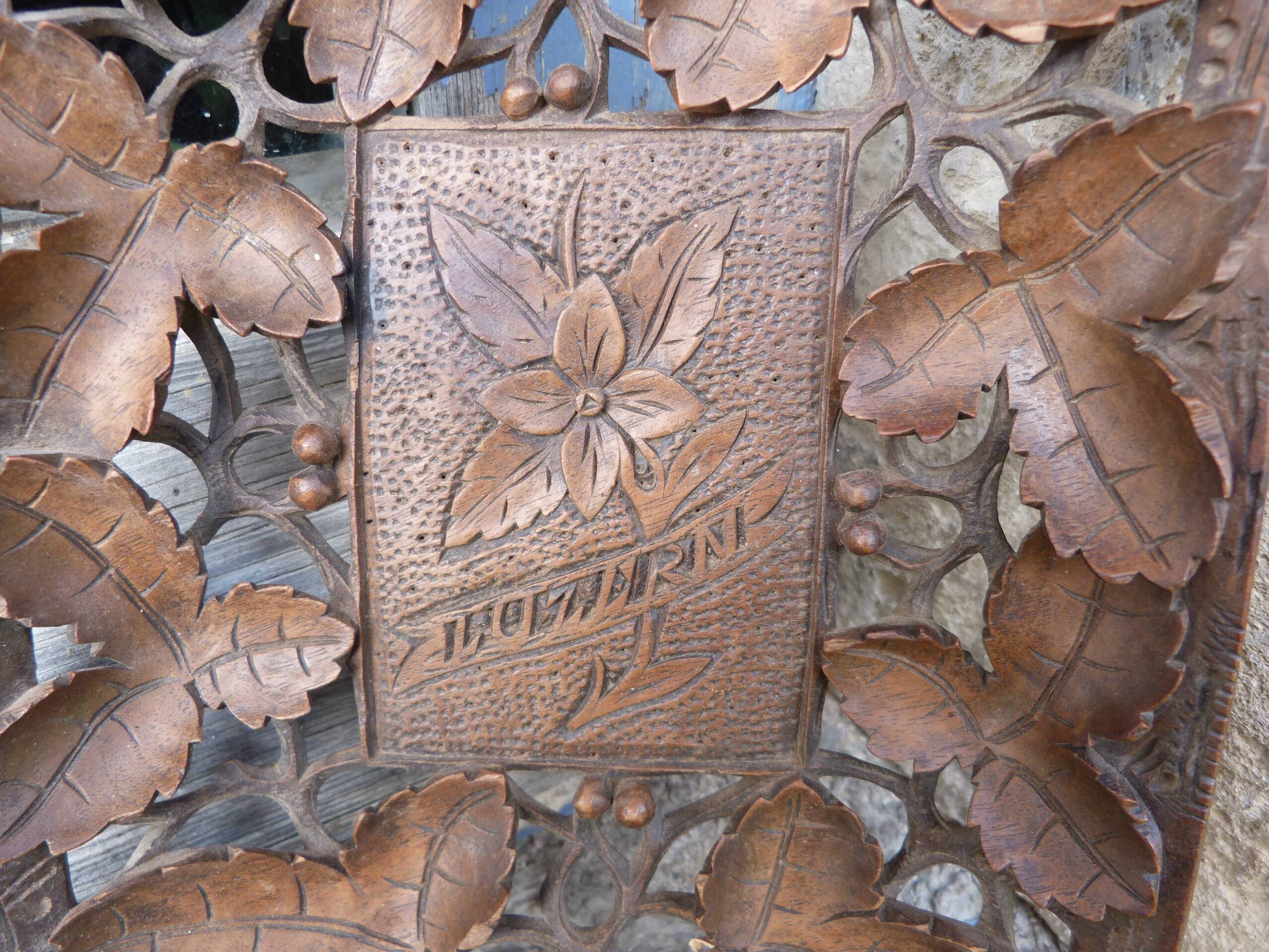 Small wooden tray cut out with leaf patterns