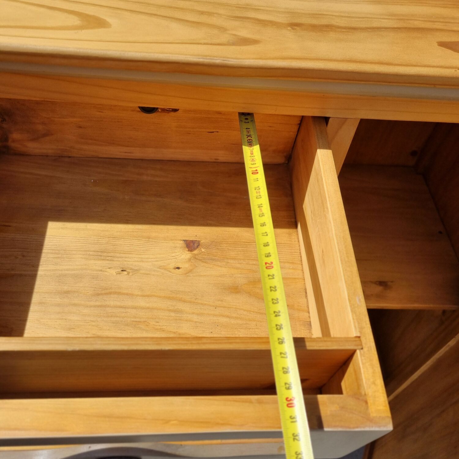 Grain merchant-style furniture with 6 drawers and a cupboard.