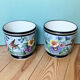 Lot de deux cache-pots en porcelaine de Limoges